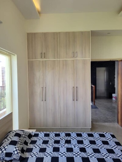 1RK fully furnished with double bed with mattress, almirah, kitchen chimney, chair and table.